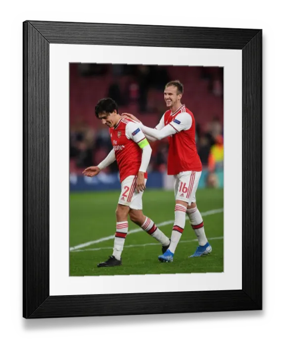 Framed Print : Arsenal's Bellerin and Holding Celebrate Europa League Victory Over Standard Liege Framed Print : Arsenal's Bellerin and Holding Celebrate Europa League Victory Over Standard Liege