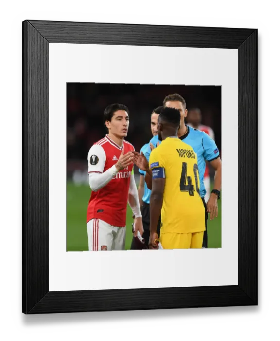Framed Print : Arsenal vs Standard Liege: Hector Bellerin and Paul-Jose Mpoku Exchange Handshakes in Europa League Match (Arsenal FC 2019-20)