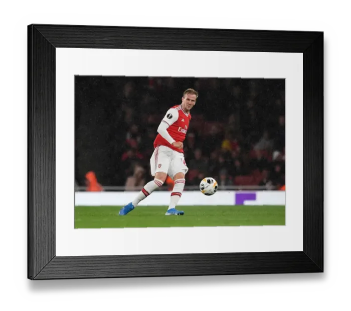 Framed Print : Arsenal vs Standard Liege: Europa League Showdown at Emirates Stadium