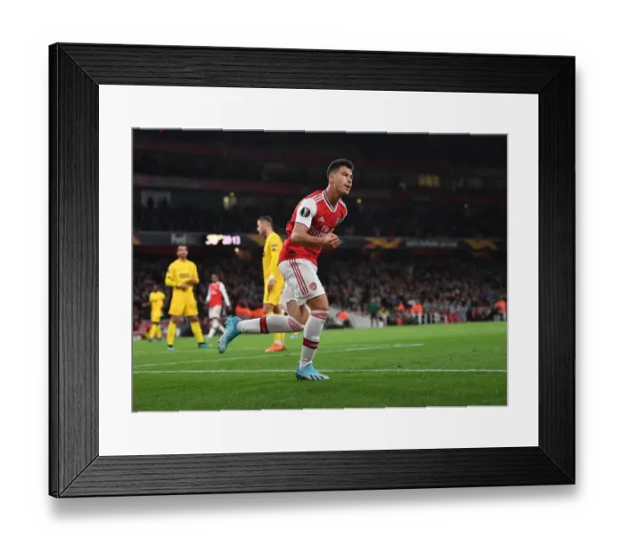 Framed Print : Arsenal's Martinelli Scores First Goal in Europa League Victory over Standard Liege Framed Print : Arsenal's Martinelli Scores First Goal in Europa League Victory over Standard Liege