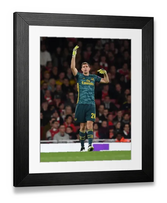 Framed Print : Arsenal's Emi Martinez in Action Against Standard Liege in Europa League Match