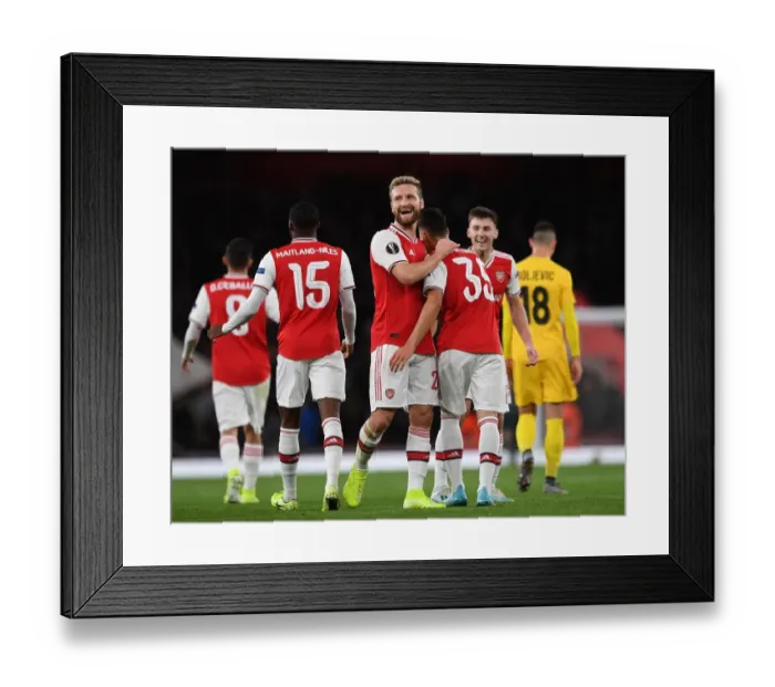 Framed Print : Arsenal's Martinelli Scores Second Goal in Europa League Victory over Standard Liege Framed Print : Arsenal's Martinelli Scores Second Goal in Europa League Victory over Standard Liege