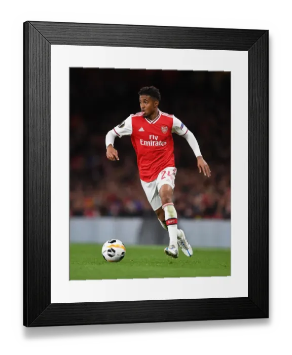 Framed Print : Arsenal's Nelson Shines: Europa League Triumph Over Standard Liege Framed Print : Arsenal's Nelson Shines: Europa League Triumph Over Standard Liege