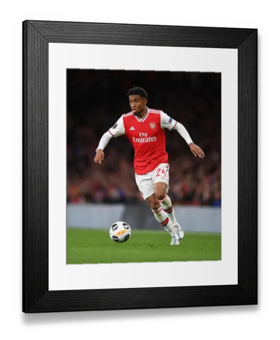 Framed Print : Reiss Nelson Shines: Arsenal's Europa League Triumph Over Standard Liege