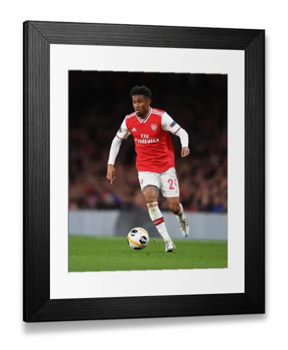 Framed Print : Arsenal vs Standard Liege: Europa League Showdown at Emirates Stadium