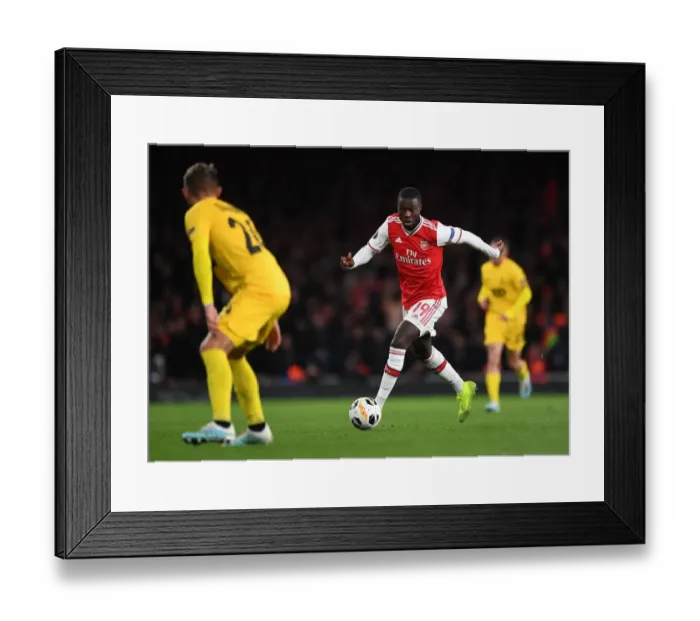 Framed Print : Arsenal's Nicolas Pepe Dazzles: Dominating Standard Liege in Europa League