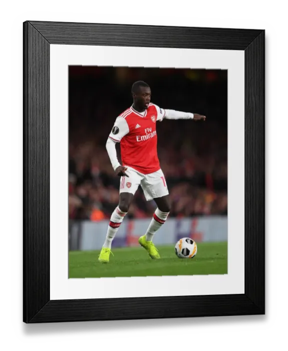 Framed Print : Arsenal's Nicolas Pepe Shines in Europa League Clash against Standard Liege
