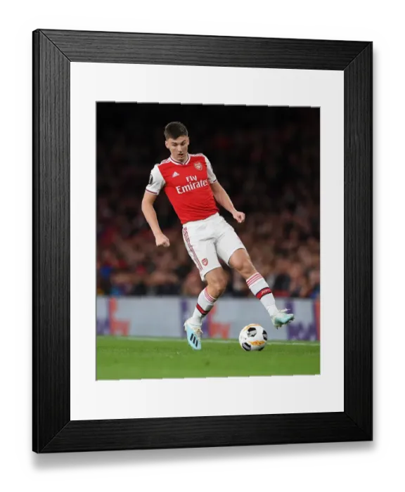 Framed Print : Arsenal's Kieran Tierney in Action during Europa League Match against Standard Liege Framed Print : Arsenal's Kieran Tierney in Action during Europa League Match against Standard Liege