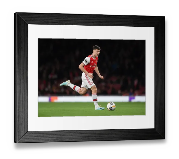 Framed Print : Arsenal's Kieran Tierney in Action against Standard Liege in Europa League Framed Print : Arsenal's Kieran Tierney in Action against Standard Liege in Europa League