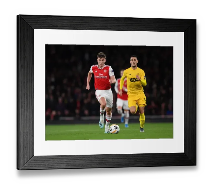 Framed Print : Arsenal's Kieran Tierney in Action against Standard Liege in Europa League