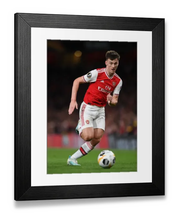 Framed Print : Arsenal's Kieran Tierney in Action during Europa League Match against Standard Liege Framed Print : Arsenal's Kieran Tierney in Action during Europa League Match against Standard Liege