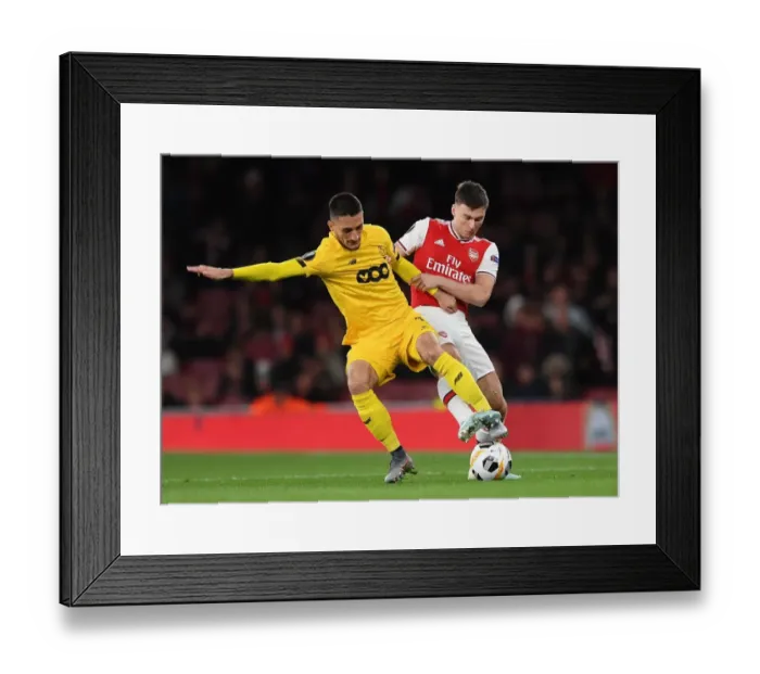 Framed Print : Arsenal vs Standard Liege: Kieran Tierney Clashes with Aleksandar Beljevic in Europa League Showdown Framed Print : Arsenal vs Standard Liege: Kieran Tierney Clashes with Aleksandar Beljevic in Europa League Showdown