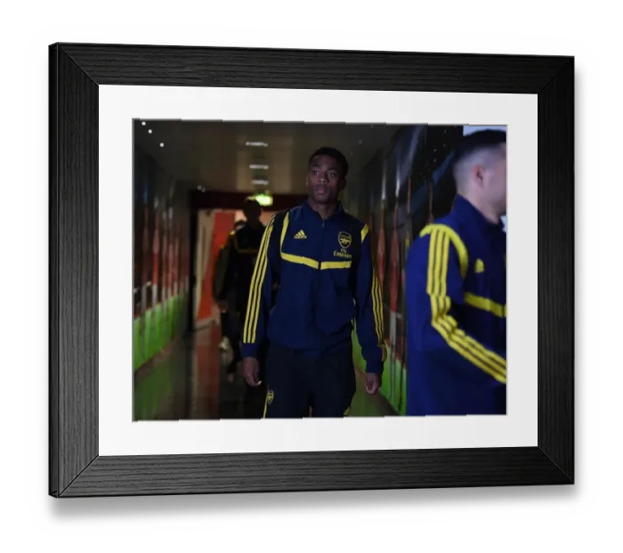 Framed Print : Arsenal's Joe Willock Gears Up for Arsenal FC vs Standard Liege in UEFA Europa League