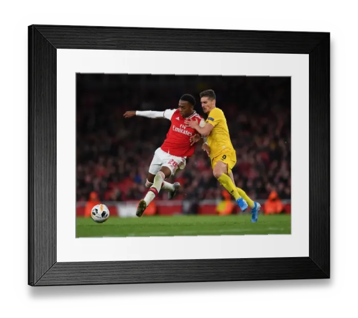Framed Print : Arsenal's Joe Willock Clashes with Standard Liege's Gojko Cimirot in Europa League Match Framed Print : Arsenal's Joe Willock Clashes with Standard Liege's Gojko Cimirot in Europa League Match