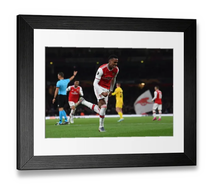 Framed Print : Arsenal's Joe Willock Scores Third Goal Against Standard Liege in Europa League Match