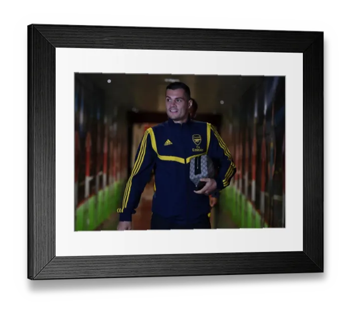 Framed Print : Arsenal's Granit Xhaka Prepares for Standard Liege Clash in Europa League Group Stage Framed Print : Arsenal's Granit Xhaka Prepares for Standard Liege Clash in Europa League Group Stage