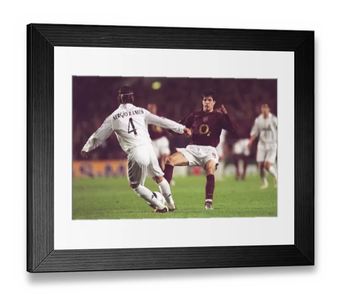 Framed Print : Cesc Fabregas (Arsenal) Sergio Ramos (Real Madrid)