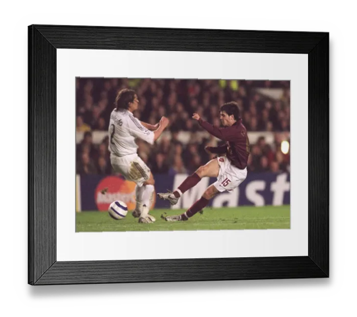 Framed Print : Cesc Fabregas (Arsenal) Michel Salgado (Real Madrid) Framed Print : Cesc Fabregas (Arsenal) Michel Salgado (Real Madrid)