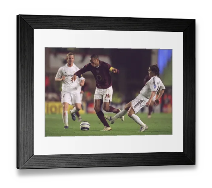 Framed Print : Thierry Henry (Arsenal) Michel Salgado (Real) Framed Print : Thierry Henry (Arsenal) Michel Salgado (Real)