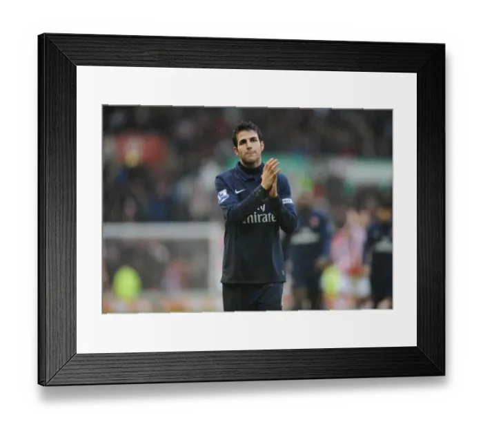 Framed Print : Arsenal captain Cesc Fabregas claps the fans after the match. Stoke City 3: 1 Arsenal