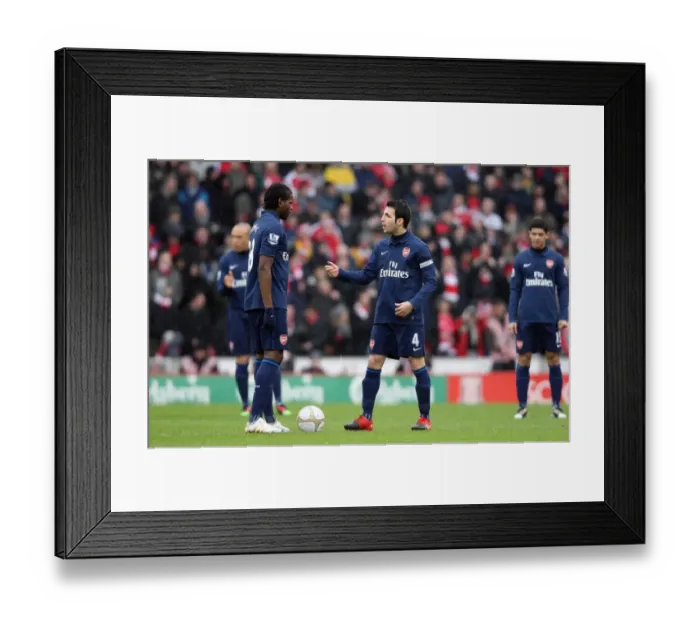 Framed Print : Cesc Fabregas talks to Jay Emmanuel-Thomas (Arsenal) just before the kick off