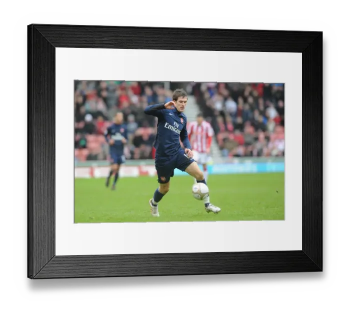 Framed Print : Aaron Ramsey (Arsenal). Stoke City 3: 1 Arsenal, FA Cup 4th round, The Britannia Stadium