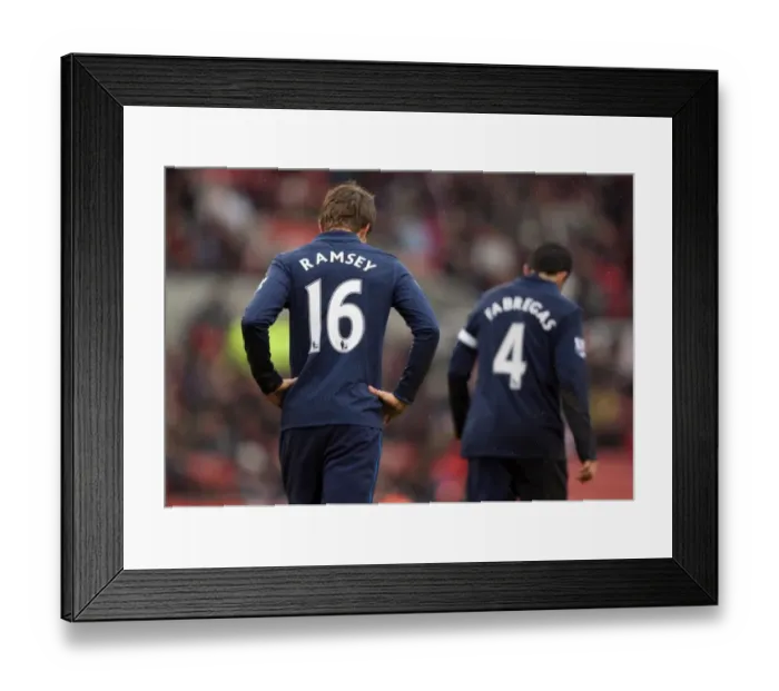 Framed Print : Aaron Ramsey and Cesc Fabregas (Arsenal). Stoke City 3: 1 Arsenal. FA Cup 4th Round