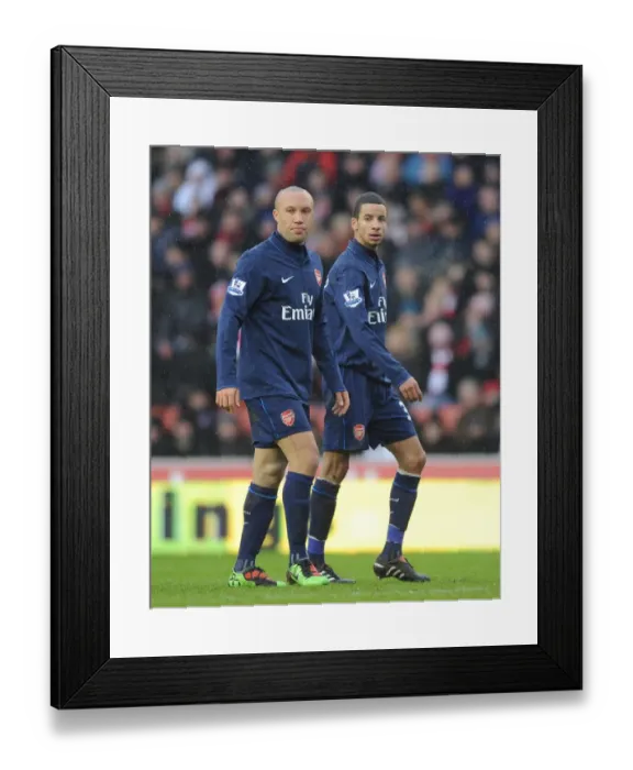 Framed Print : Mikael Silvestre and Craig Eastmond (Arsenal). Stoke City 3: 1 Arsenal, FA Cup 4th round