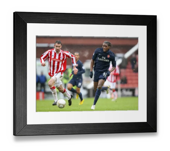 Framed Print : Jay Emmanuel-Thomas vs. Danny Higginbotham: Stoke City's Upset of Arsenal in FA Cup (3-1) Framed Print : Jay Emmanuel-Thomas vs. Danny Higginbotham: Stoke City's Upset of Arsenal in FA Cup (3-1)