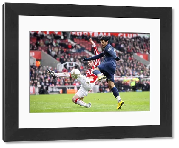 Carlos Vela (Arsenal) Danny Higginbotham (Stoke). Stoke City 3: 1 Arsenal