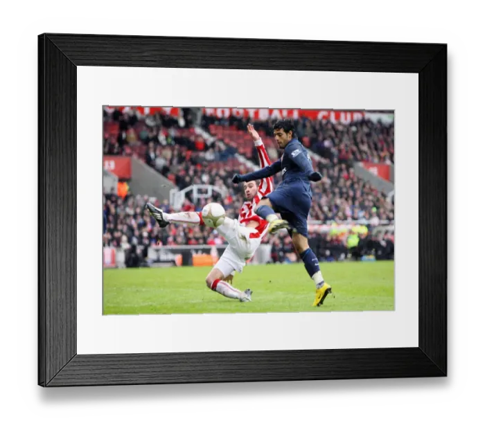 Framed Print : Carlos Vela (Arsenal) Danny Higginbotham (Stoke). Stoke City 3: 1 Arsenal