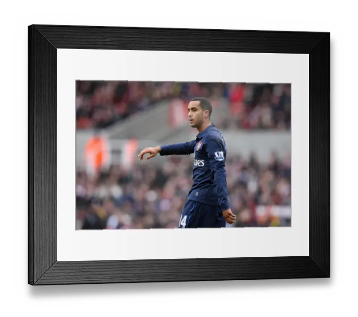 Framed Print : Theo Walcott (Arsenal). Stoke City 3: 1 Arsenal. FA Cup 4th Round. The Britannia Stadium