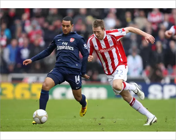 Theo Walcott (Arsenal) Danny Collins (Stoke). Stoke City 3: 1 Arsenal. FA Cup 4th Round