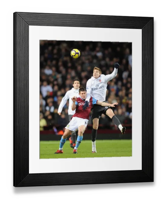 Framed Print : Nicklas Bendtner (Arsenal) James Milner (Villa). Aston Villa 0: 0 Arsenal Framed Print : Nicklas Bendtner (Arsenal) James Milner (Villa). Aston Villa 0: 0 Arsenal