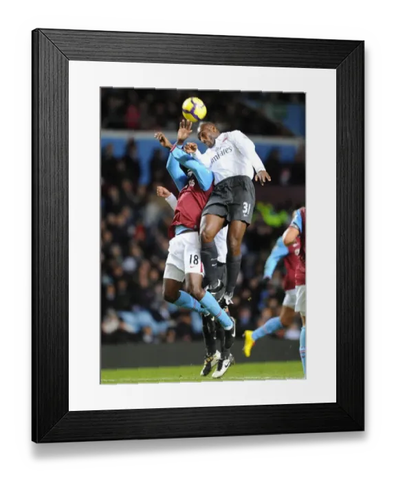 Framed Print : Sol Campbell (Arsenal) Emile Heskey (Villa). Aston Villa 0: 0 Arsenal. Barclays Premier League