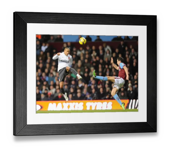Framed Print : Gael Clichy (Arsenal) Stewart Downing (Villa). Aston Villa 0: 0 Arsenal Framed Print : Gael Clichy (Arsenal) Stewart Downing (Villa). Aston Villa 0: 0 Arsenal