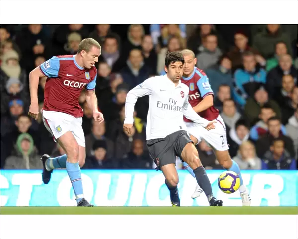 Eduardo (Arsenal) Richard Dunne (Villa). Aston Villa 0: 0 Arsenal. Barclays Premier League