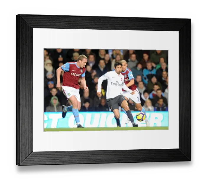 Framed Print : Eduardo (Arsenal) Richard Dunne (Villa). Aston Villa 0: 0 Arsenal. Barclays Premier League Framed Print : Eduardo (Arsenal) Richard Dunne (Villa). Aston Villa 0: 0 Arsenal. Barclays Premier League