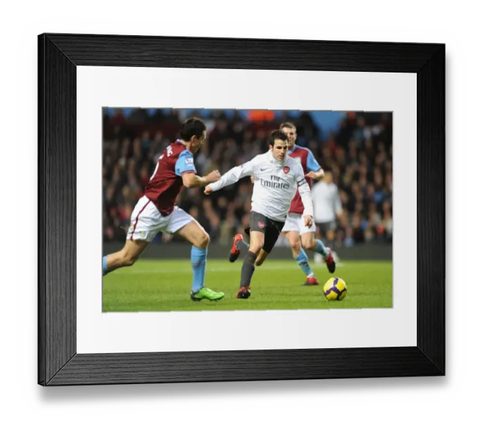 Framed Print : Cesc Fabregas (Arsenal) Stewart Downing (Villa). Aston Villa 0: 0 Arsenal