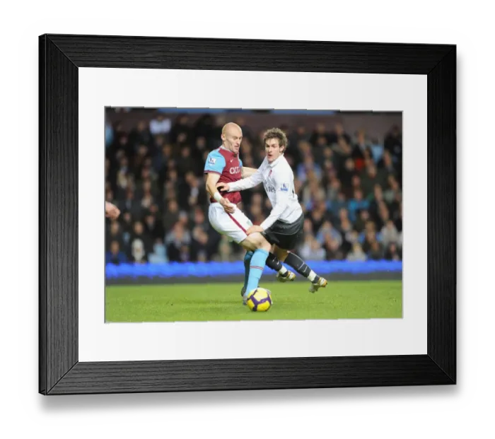Framed Print : Aaron Ramsey (Arsenal) James Collins (Villa). Aston Villa 0: 0 Arsenal. Barclays Premier League