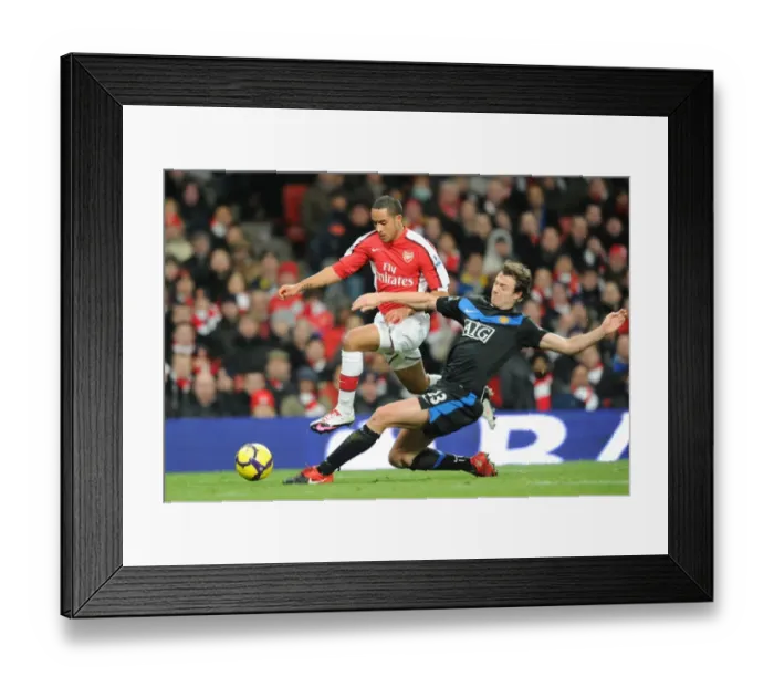 Framed Print : Theo Walcott vs. Jonny Evans: Manchester United's Dominance over Arsenal (31 / 10 / 2010) Framed Print : Theo Walcott vs. Jonny Evans: Manchester United's Dominance over Arsenal (31 / 10 / 2010)