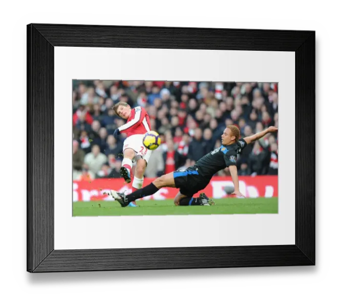 Framed Print : Andrey Arshavin (Arsenal) Wes Brown (Man United). Arsenal 1: 3 Manchester United