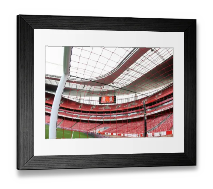 Framed Print : Red Nike goalnets as part of their Lace Up Save lives charity capaign. Arsenal 1
