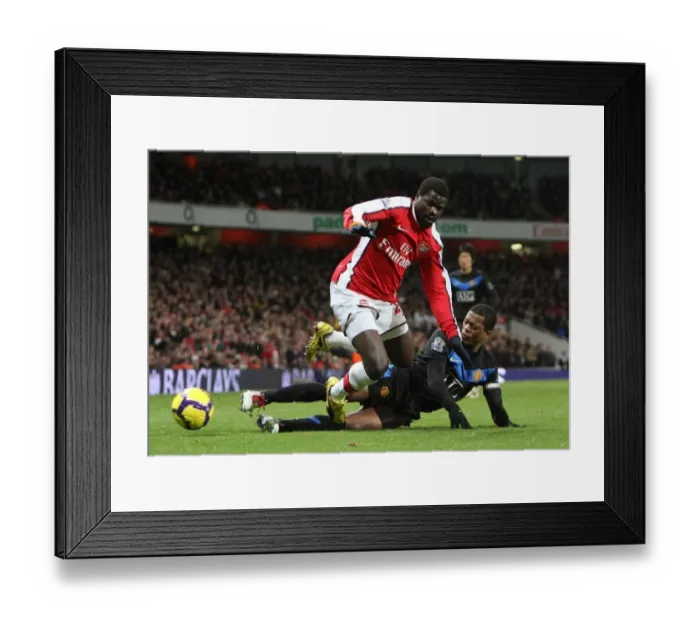 Framed Print : Emmanuel Eboue vs. Patrice Evra: Arsenal vs. Manchester United's Intense Rivalry (31 / 01 / 10)