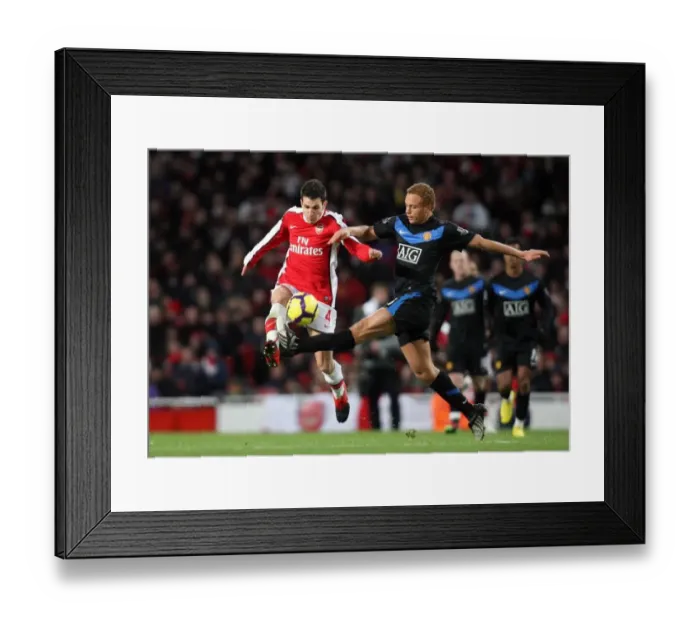 Framed Print : Cesc Fabregas (Arsenal) Wes Brown (Man Utd). Arsenal 1: 3 Manchester United