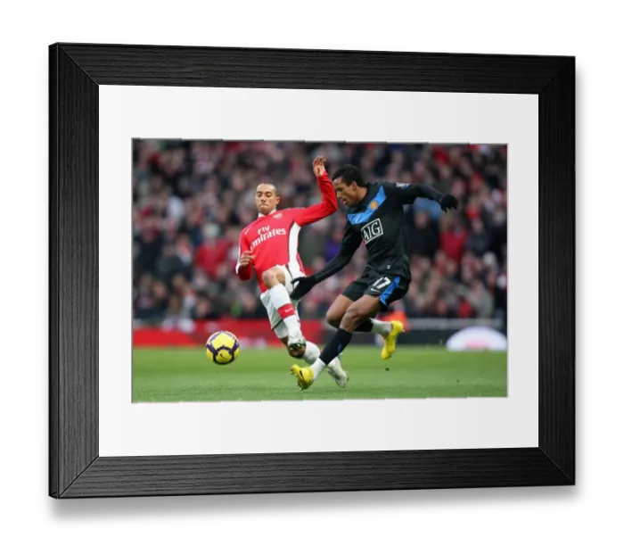 Framed Print : Clash at Emirates: Gael Clichy vs. Nani in Arsenal's 1-3 Defeat to Manchester United in the Barclays Premier League Framed Print : Clash at Emirates: Gael Clichy vs. Nani in Arsenal's 1-3 Defeat to Manchester United in the Barclays Premier League