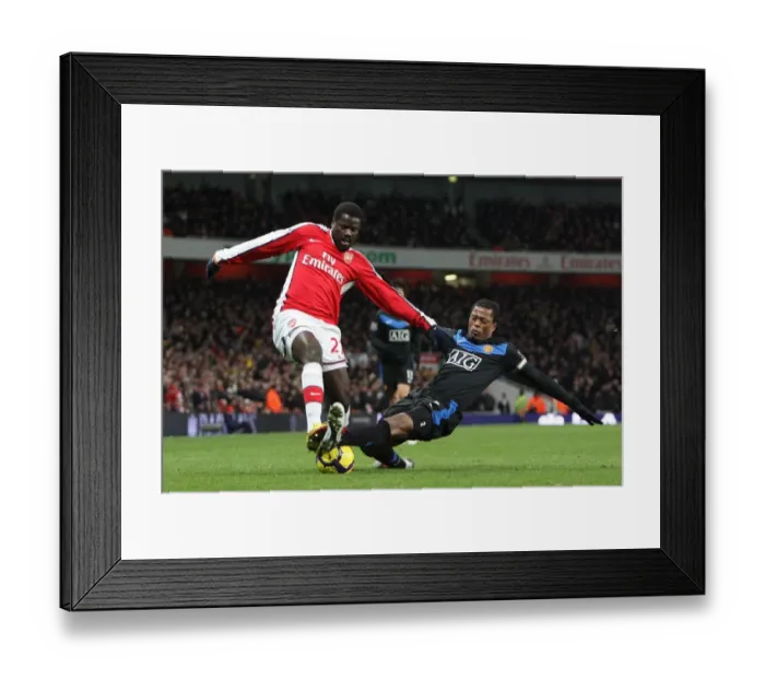 Framed Print : Emmanuel Eboue (Arsenal) Patrice Evra (Man Utd). Arsenal 1: 3 Manchester United