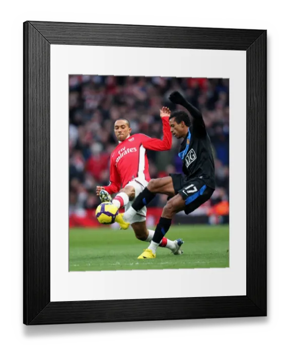 Framed Print : Gael Clichy (Arsenal) Nani (Man Utd). Arsenal 1: 3 Manchester United. Barclays Premier League Framed Print : Gael Clichy (Arsenal) Nani (Man Utd). Arsenal 1: 3 Manchester United. Barclays Premier League