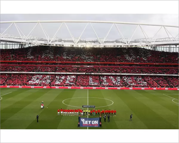 The Arsenal and Manchester United teams walk out onto the pitch with the Nike Lace Up Save Lives cards held up be the fans. Arsenal 1: 3 Manchester United. Barclays Premier League. Emirates Stadium, 31  /  1  /  10. Credit : Arsenal Football Club