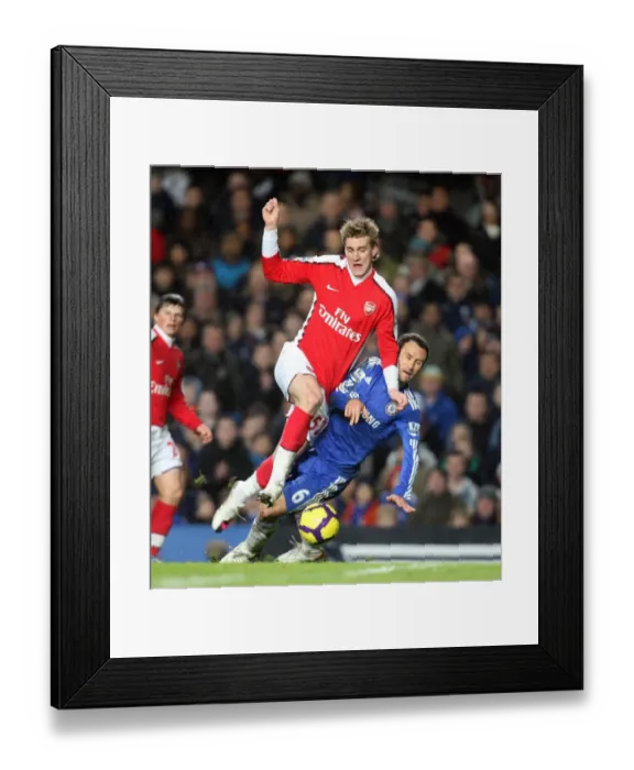 Framed Print : Bendtner vs. Carvalho: Chelsea's Victory over Arsenal in the Barclays Premier League (2010)
